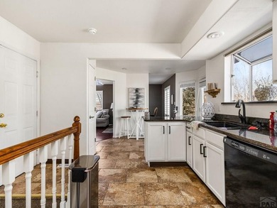 Say YES to this address-beautifully updated and truly move-in on Desert Hawk At Pueblo West in Colorado - for sale on GolfHomes.com, golf home, golf lot