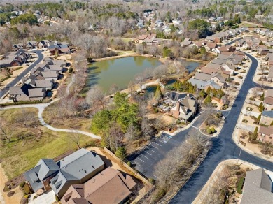 Situated in the serene, gated Cadence community, thoughtfully on Woodmont Golf and Country Club in Georgia - for sale on GolfHomes.com, golf home, golf lot