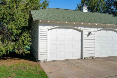 Tucked away next to the 9th hole of the Charlevoix Country Club on Charlevoix Golf and Country Club in Michigan - for sale on GolfHomes.com, golf home, golf lot