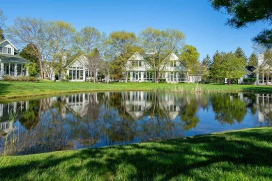 Tucked away next to the 9th hole of the Charlevoix Country Club on Charlevoix Golf and Country Club in Michigan - for sale on GolfHomes.com, golf home, golf lot