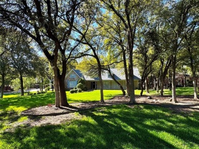 GORGEOUS CORNER LANDSCAPED DOUBLE LOT WITH LOTS OF TREES.This 2 on Pecan Plantation Country Club in Texas - for sale on GolfHomes.com, golf home, golf lot