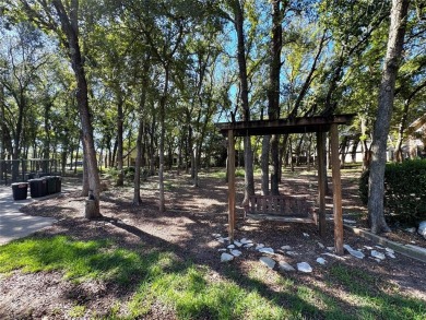 GORGEOUS CORNER LANDSCAPED DOUBLE LOT WITH LOTS OF TREES.This 2 on Pecan Plantation Country Club in Texas - for sale on GolfHomes.com, golf home, golf lot