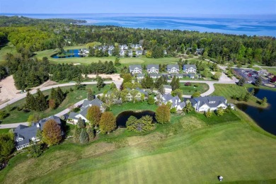 Tucked away next to the 9th hole of the Charlevoix Country Club on Charlevoix Golf and Country Club in Michigan - for sale on GolfHomes.com, golf home, golf lot