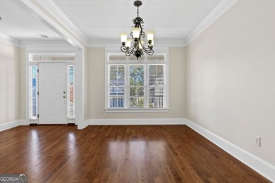 Charming 3-bedroom, 2.5-bath home located in the desirable on Harbor Club Golf and Country Club in Georgia - for sale on GolfHomes.com, golf home, golf lot