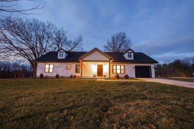 In 2021 this single-story home was custom-built on over half an on Mill Creek Golf Club in Ohio - for sale on GolfHomes.com, golf home, golf lot