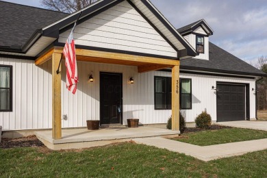 In 2021 this single-story home was custom-built on over half an on Mill Creek Golf Club in Ohio - for sale on GolfHomes.com, golf home, golf lot