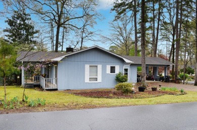 This charming home is on a corner lot with common property on on DeSoto Golf Course in Arkansas - for sale on GolfHomes.com, golf home, golf lot