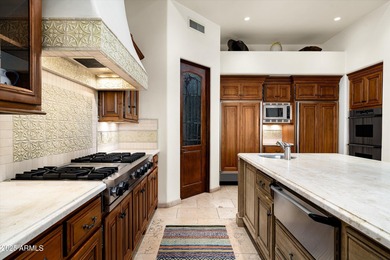 Perfectly positioned on a beautiful private lot within the gated on Camelback Golf Club in Arizona - for sale on GolfHomes.com, golf home, golf lot