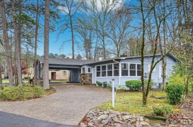 This charming home is on a corner lot with common property on on DeSoto Golf Course in Arkansas - for sale on GolfHomes.com, golf home, golf lot