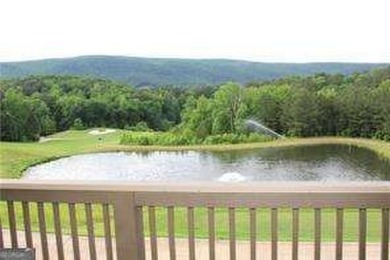 Luxury Craftsman Golf Villa Overlooks the First Tee of The on The Highlands Course at Lake Arrowhead in Georgia - for sale on GolfHomes.com, golf home, golf lot