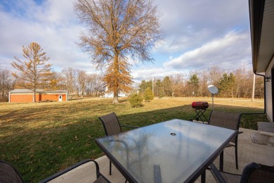 In 2021 this single-story home was custom-built on over half an on Mill Creek Golf Club in Ohio - for sale on GolfHomes.com, golf home, golf lot