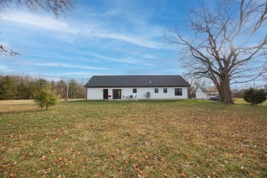 In 2021 this single-story home was custom-built on over half an on Mill Creek Golf Club in Ohio - for sale on GolfHomes.com, golf home, golf lot