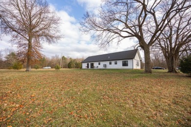 In 2021 this single-story home was custom-built on over half an on Mill Creek Golf Club in Ohio - for sale on GolfHomes.com, golf home, golf lot