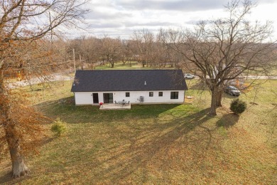 In 2021 this single-story home was custom-built on over half an on Mill Creek Golf Club in Ohio - for sale on GolfHomes.com, golf home, golf lot