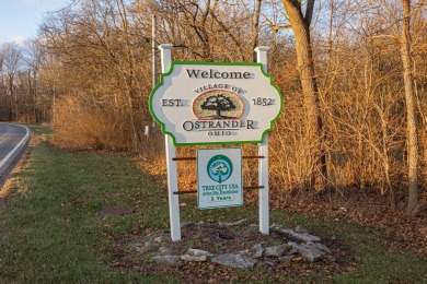 In 2021 this single-story home was custom-built on over half an on Mill Creek Golf Club in Ohio - for sale on GolfHomes.com, golf home, golf lot