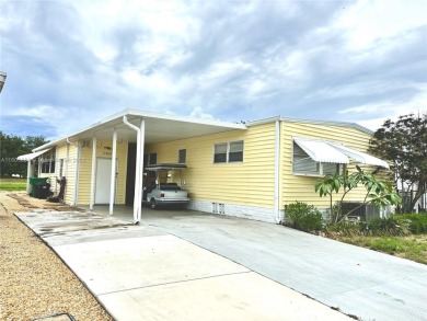 This stunning double-wide modern mobile home is located in a 55+ on Davie Golf Club in Florida - for sale on GolfHomes.com, golf home, golf lot