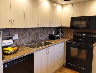 TURN KEY 900 SQ FT 1 BEDROOM IN PRESTIGIOUS ARUBA. EVERYTHING on Wynmoor Golf Course in Florida - for sale on GolfHomes.com, golf home, golf lot