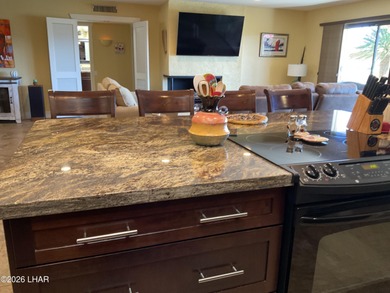 This absolute beautiful townhouse on the 12th green has had a on London Bridge Golf Course in Arizona - for sale on GolfHomes.com, golf home, golf lot