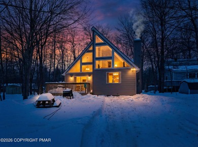 Welcome to this beautifully remodeled chalet-style home on Pocono Farms Country Club in Pennsylvania - for sale on GolfHomes.com, golf home, golf lot