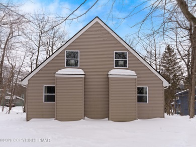 Welcome to this beautifully remodeled chalet-style home on Pocono Farms Country Club in Pennsylvania - for sale on GolfHomes.com, golf home, golf lot