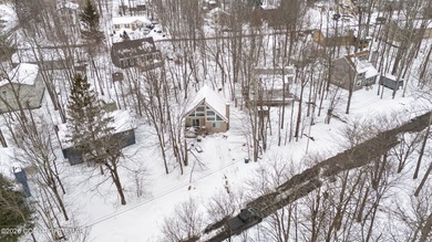 Welcome to this beautifully remodeled chalet-style home on Pocono Farms Country Club in Pennsylvania - for sale on GolfHomes.com, golf home, golf lot