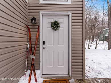 Welcome to this beautifully remodeled chalet-style home on Pocono Farms Country Club in Pennsylvania - for sale on GolfHomes.com, golf home, golf lot
