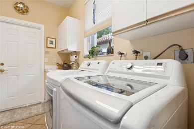 BEAUTIFUL 4 BEDROOM 2 BATH POOL HOME SITUATED ON GOLF COURSE & on TPC Eagle Trace in Florida - for sale on GolfHomes.com, golf home, golf lot