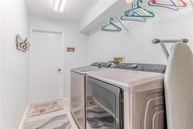 Discover the perfect retreat in the highly sought-after Timber on Timber Pines Golf Course in Florida - for sale on GolfHomes.com, golf home, golf lot