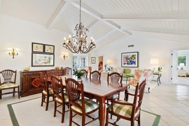 Nestled within lush landscaping and peaceful water views, this on Quail Ridge Golf Course and Country Club in Florida - for sale on GolfHomes.com, golf home, golf lot