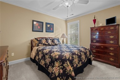 Welcome to 60 Rolling Pines, nestled on a quiet cul de sac on Anderson Creek Golf Club in North Carolina - for sale on GolfHomes.com, golf home, golf lot
