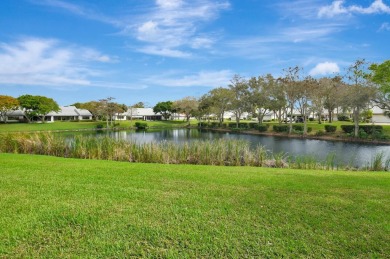 This charming villa in the Essex community offers serene water on Hunters Run Golf and Country Club in Florida - for sale on GolfHomes.com, golf home, golf lot