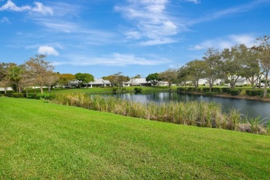 This charming villa in the Essex community offers serene water on Hunters Run Golf and Country Club in Florida - for sale on GolfHomes.com, golf home, golf lot