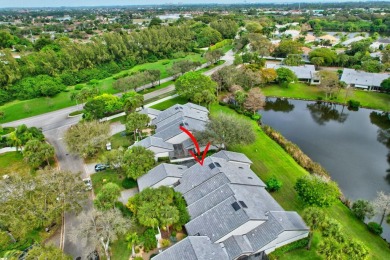 This charming villa in the Essex community offers serene water on Hunters Run Golf and Country Club in Florida - for sale on GolfHomes.com, golf home, golf lot