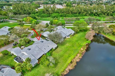 This charming villa in the Essex community offers serene water on Hunters Run Golf and Country Club in Florida - for sale on GolfHomes.com, golf home, golf lot