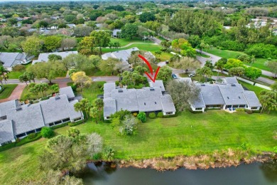 This charming villa in the Essex community offers serene water on Hunters Run Golf and Country Club in Florida - for sale on GolfHomes.com, golf home, golf lot