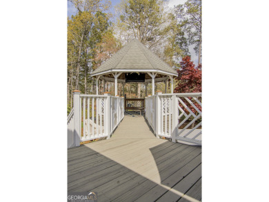 An incredible opportunity to own a beautifully updated home on a on Stonebridge Golf Club in Georgia - for sale on GolfHomes.com, golf home, golf lot