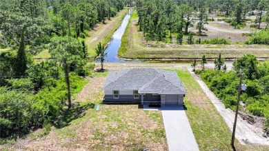 INTERSECTING CANAL VIEWS! You Will Be Amazed By The Quality Of on Mirror Lakes Golf Club in Florida - for sale on GolfHomes.com, golf home, golf lot