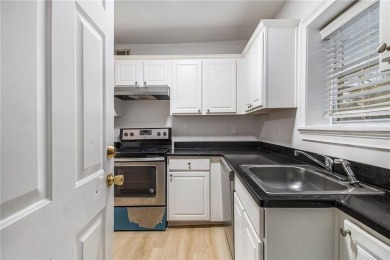 Unbeatable value for a 2BR condo inside the perimeter in this on Alfred Tup Holmes Golf Course in Georgia - for sale on GolfHomes.com, golf home, golf lot