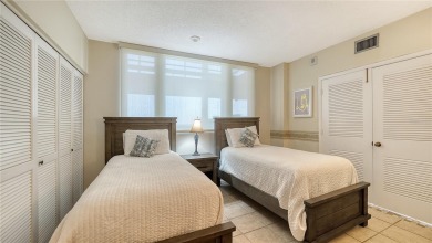 This direct Gulf-front residence at Beachplace offers an on Links on Longboat Golf Club in Florida - for sale on GolfHomes.com, golf home, golf lot