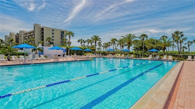 This direct Gulf-front residence at Beachplace offers an on Links on Longboat Golf Club in Florida - for sale on GolfHomes.com, golf home, golf lot