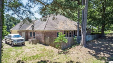 This is a beautiful 3 bedroom/ 2 bath home located right on the on Lake D Arbonne Country Club in Louisiana - for sale on GolfHomes.com, golf home, golf lot