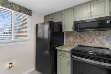 Under contract-accepting backup offers. Beautiful Ground Floor on Kingsway Country Club in Florida - for sale on GolfHomes.com, golf home, golf lot