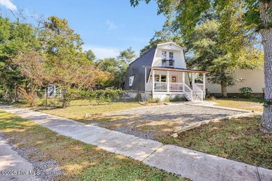 Welcome to 412 Womble Street which is located in the highly on Founders Club At St. James Plantation in North Carolina - for sale on GolfHomes.com, golf home, golf lot