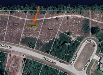 This lot is situated on a quiet street with over a quarter acre on Duffys Golf Center in Florida - for sale on GolfHomes.com, golf home, golf lot