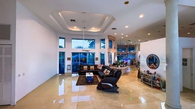 Panoramic golf and water views! Elegant home located on the 8th on TPC Eagle Trace in Florida - for sale on GolfHomes.com, golf home, golf lot