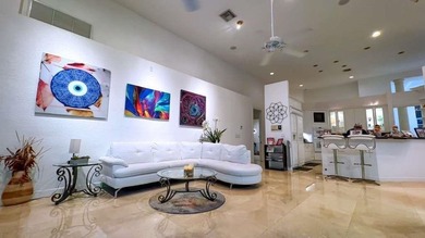 Panoramic golf and water views! Elegant home located on the 8th on TPC Eagle Trace in Florida - for sale on GolfHomes.com, golf home, golf lot