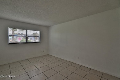 An affordable 2 bedroom, 2 bath condo unit on the 1st floor in a on Daytona Beach Golf Club in Florida - for sale on GolfHomes.com, golf home, golf lot