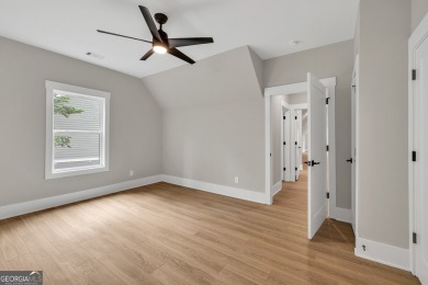 The Reagan plan built by Tradecraft Homes.  Luxury awaits you in on Harbor Club Golf and Country Club in Georgia - for sale on GolfHomes.com, golf home, golf lot