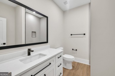 The Reagan plan built by Tradecraft Homes.  Luxury awaits you in on Harbor Club Golf and Country Club in Georgia - for sale on GolfHomes.com, golf home, golf lot
