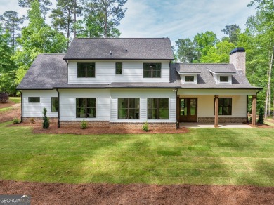 The Reagan plan built by Tradecraft Homes.  Luxury awaits you in on Harbor Club Golf and Country Club in Georgia - for sale on GolfHomes.com, golf home, golf lot